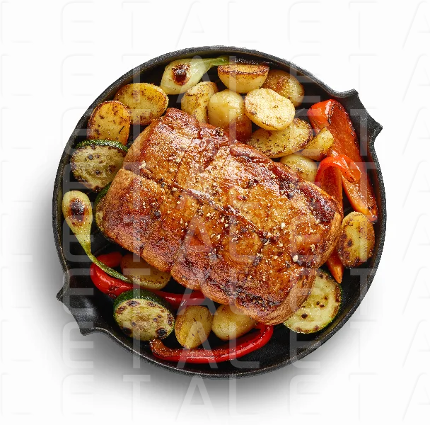 whole roast pork and vegetables