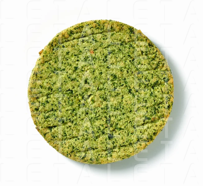 vegan burger with basil leaves