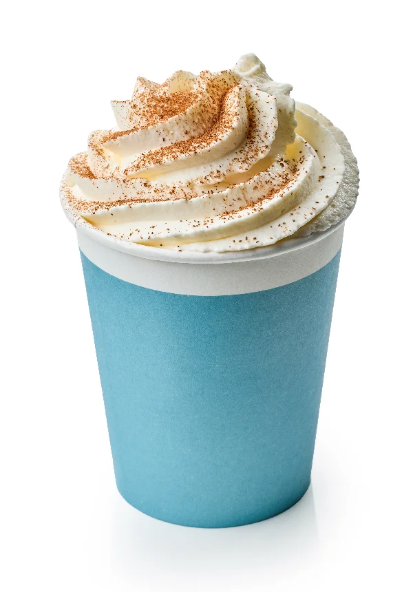 latte coffee drink in take away cup decorated with whipped cream