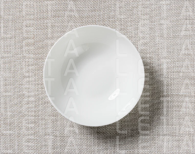 empty white bowl on table
