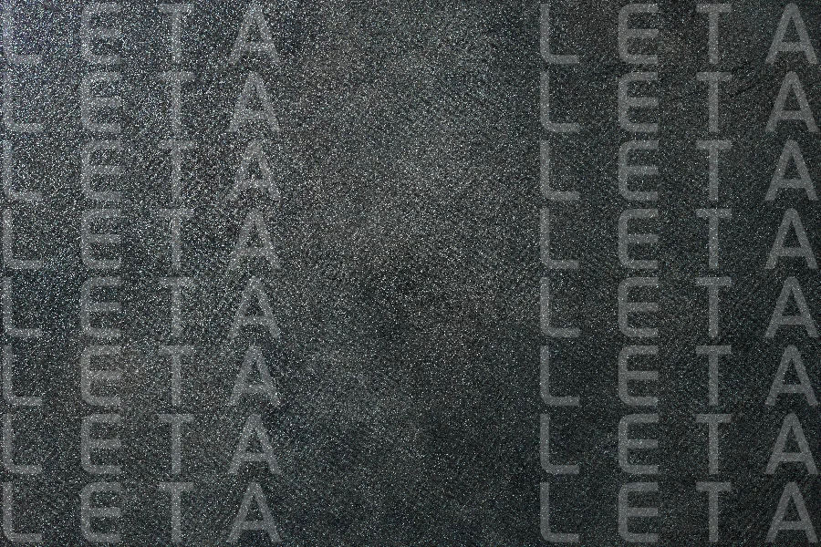 fragment of dark grey table top