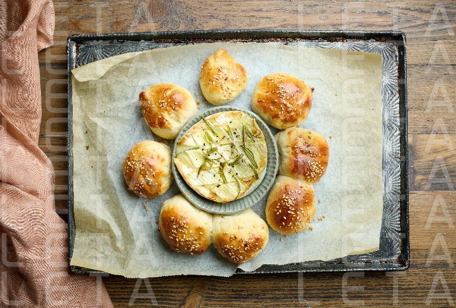 freshly baked buns and melted brie cheese