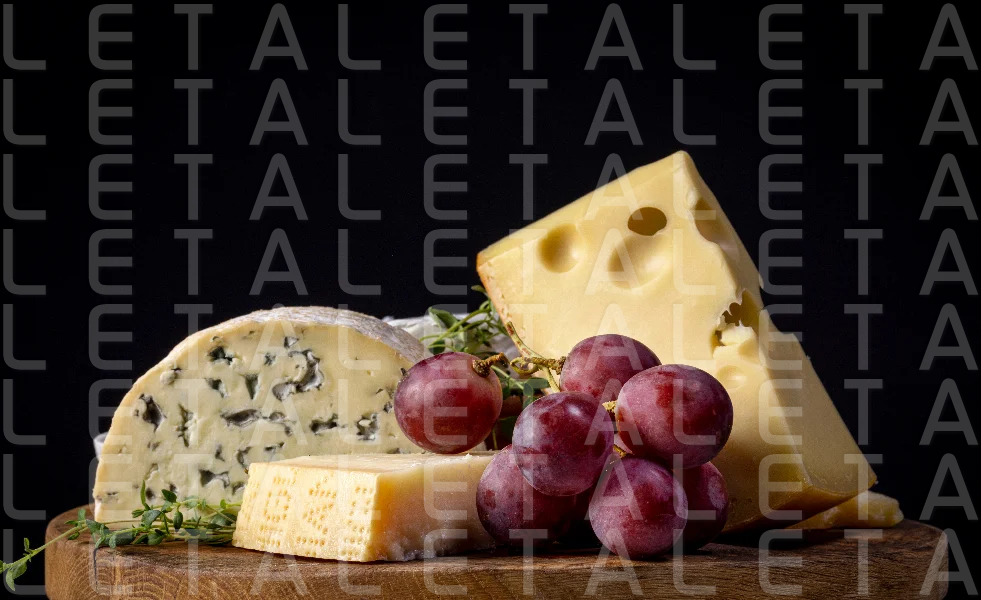 still life with various cheese and grape