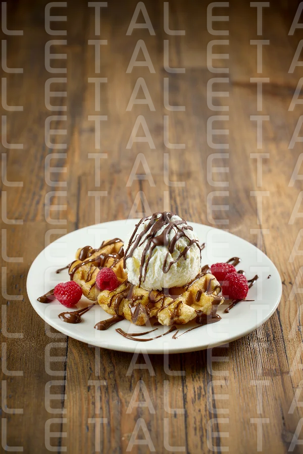 plate of belgian waffle with ice cream