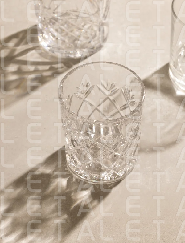 empty glasses on beige background