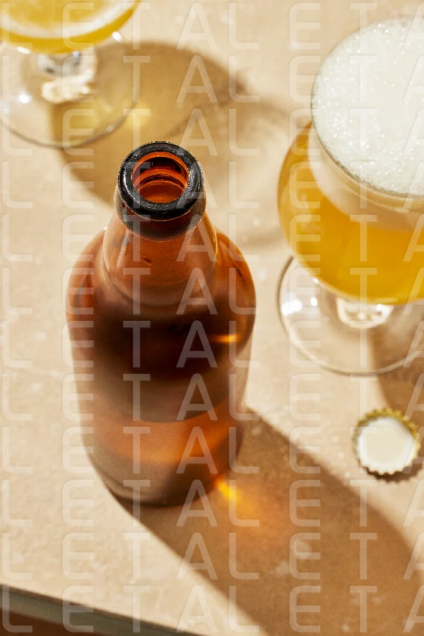 bottle and glasses of beer