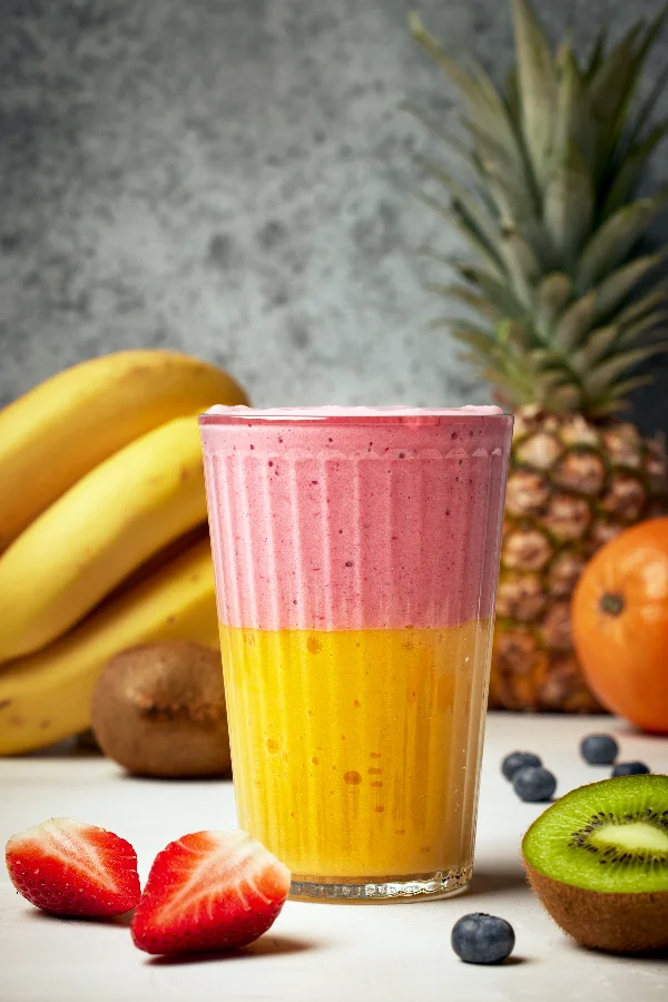 glass of fresh delicious colorful smoothie