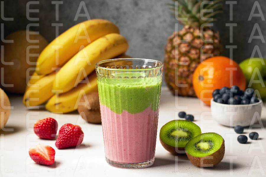 glass of fresh delicious colorful smoothie