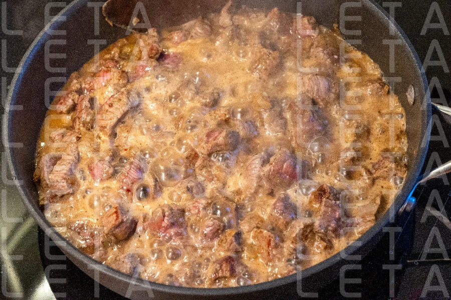 the meat is stewed in a pan