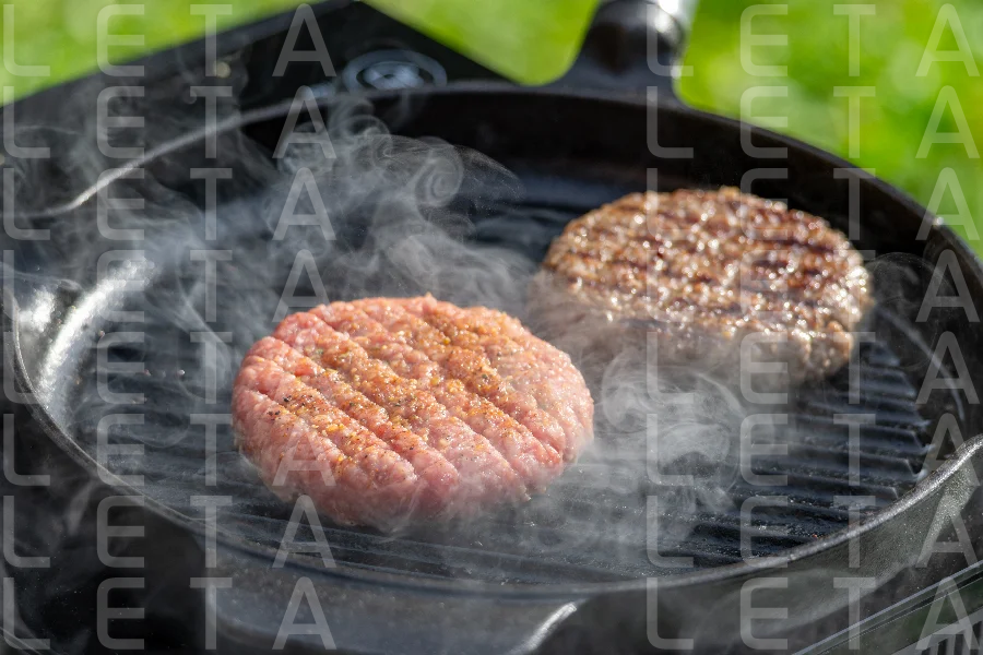 burger meat on grill pan