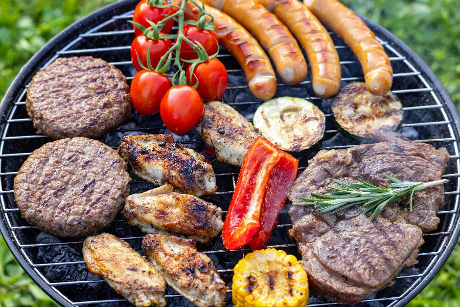 various meat and vegetables on grill
