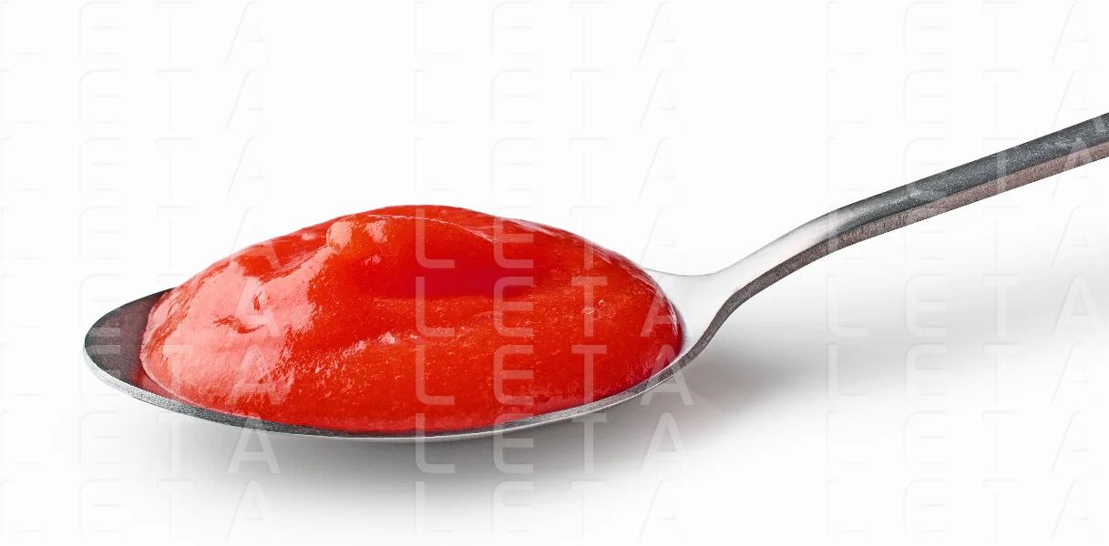 spoon of tomato puree