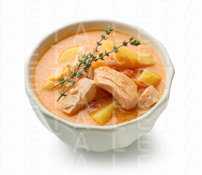 bowl of salmon and vegetable soup