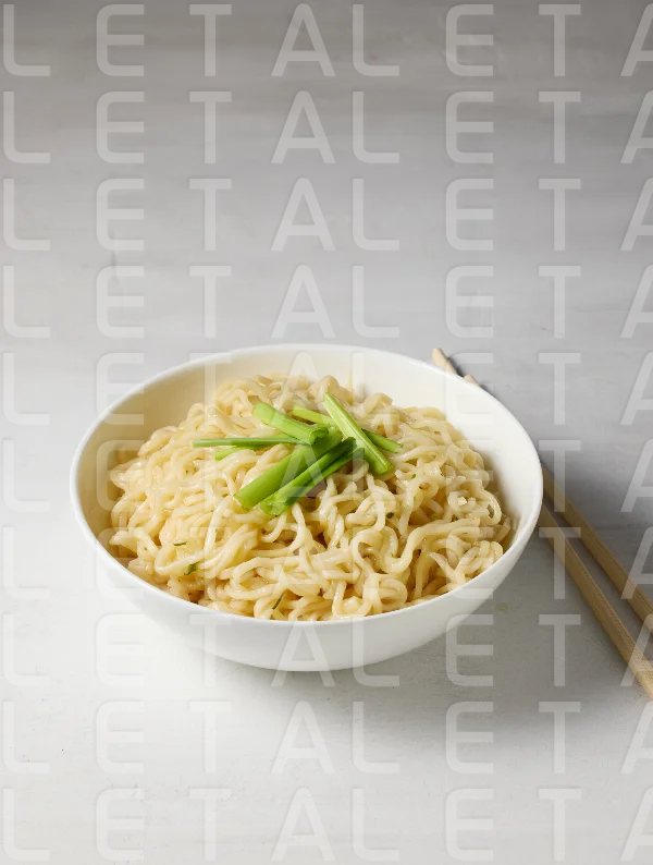 bowl of boiled noodles and chopsticks