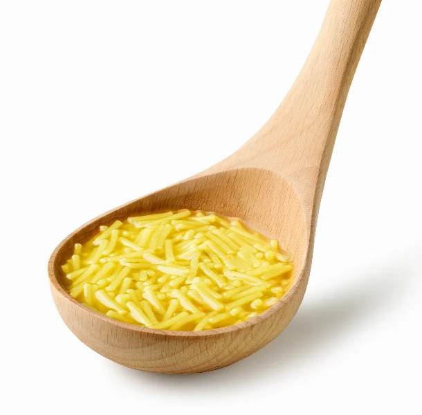 chicken noodles soup in wooden ladle