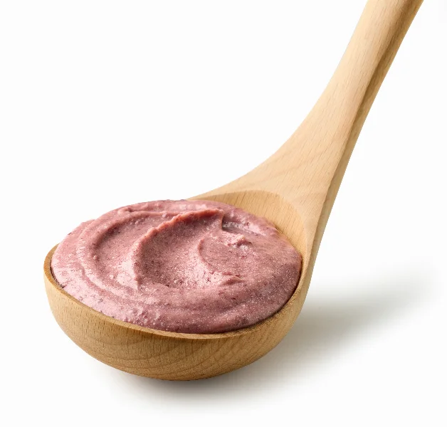red beans hummus in wooden ladle