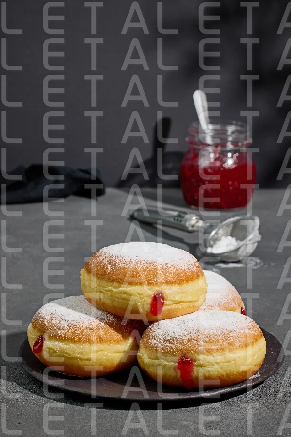 jelly donuts on grey background