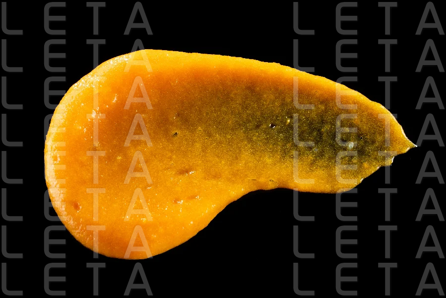 vegetable puree on black background