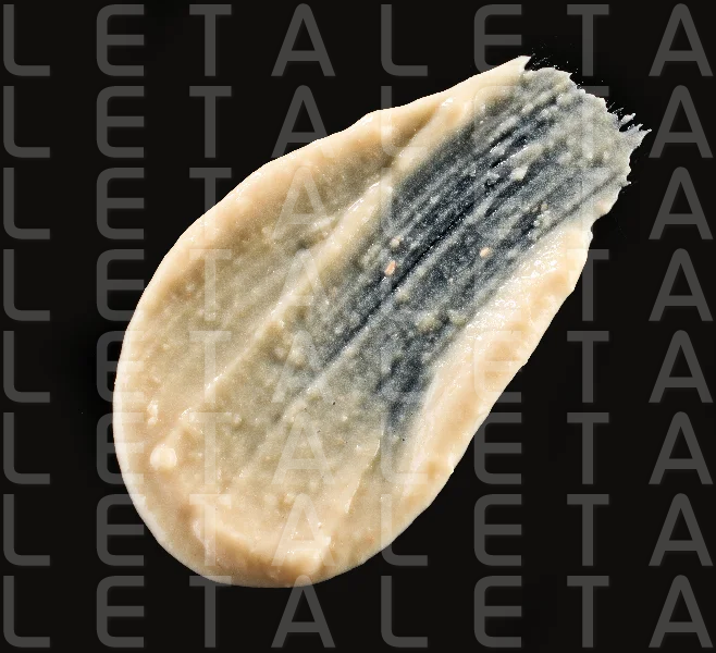 hummus on black background